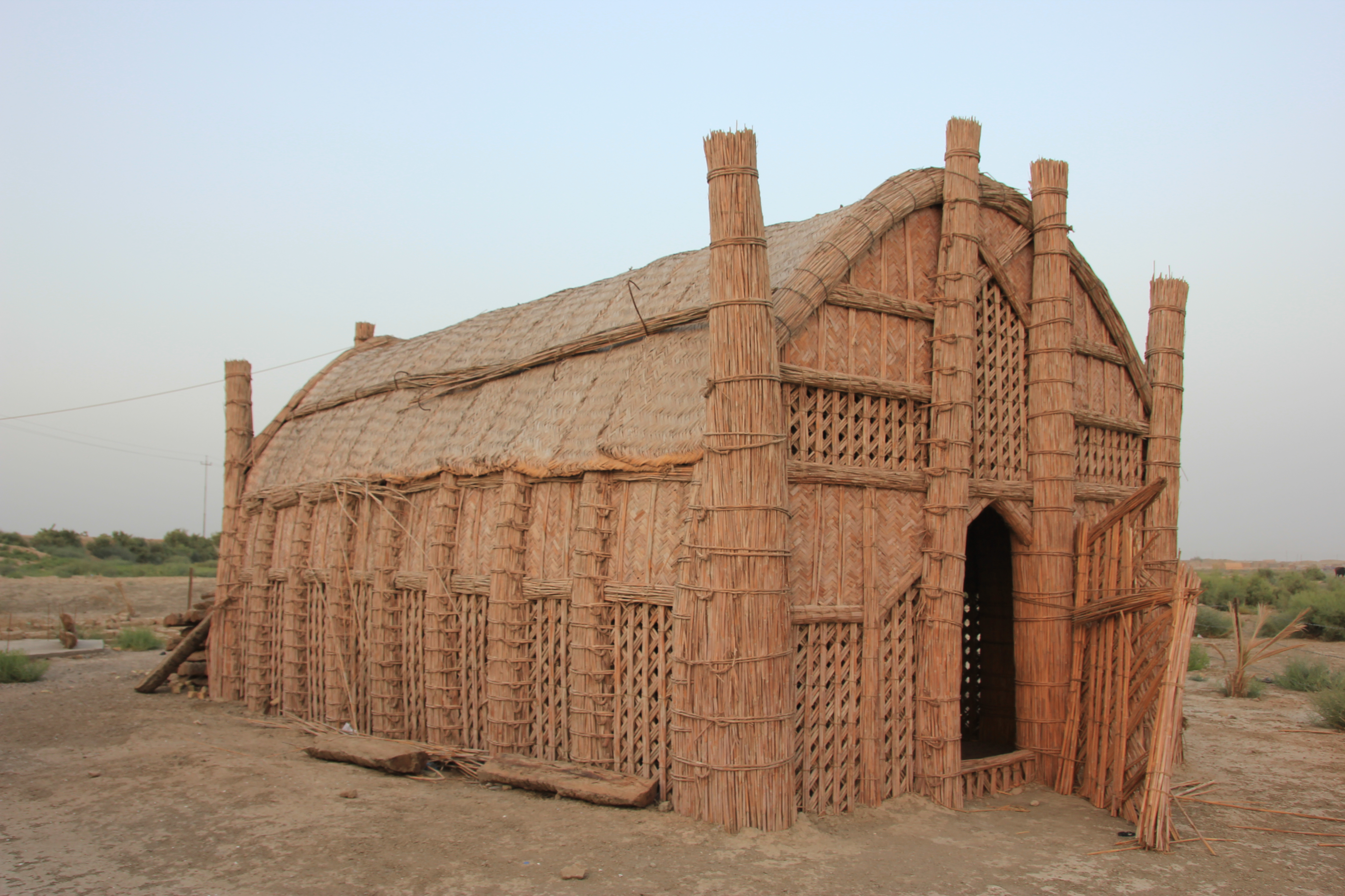 a long hall structure made of bundled reeds